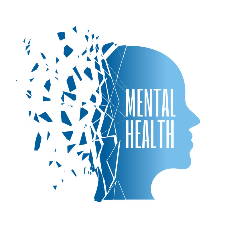 Abstract blue graphic of a human head dissolving into fragments, with the words “Mental Health” in bold letters inside; visually representing mental health awareness and treatment, including Mental Health Treatment India.