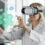 Healthcare professional using virtual reality headset to interact with futuristic medical icons, symbolizing innovation and Health Tech Hubs in India for dental and medical device solutions.