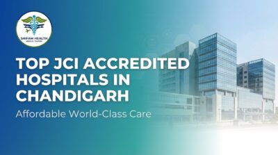 Shifam Health Medical Tourism promotional banner titled "Top JCI Accredited Hospitals in Chandigarh (2026) — Affordable World-Class Care," featuring a modern multi-storey glass hospital building set against a blue-to-teal gradient background with digital healthcare icons including a medical cross, clipboard, and hexagonal grid pattern.