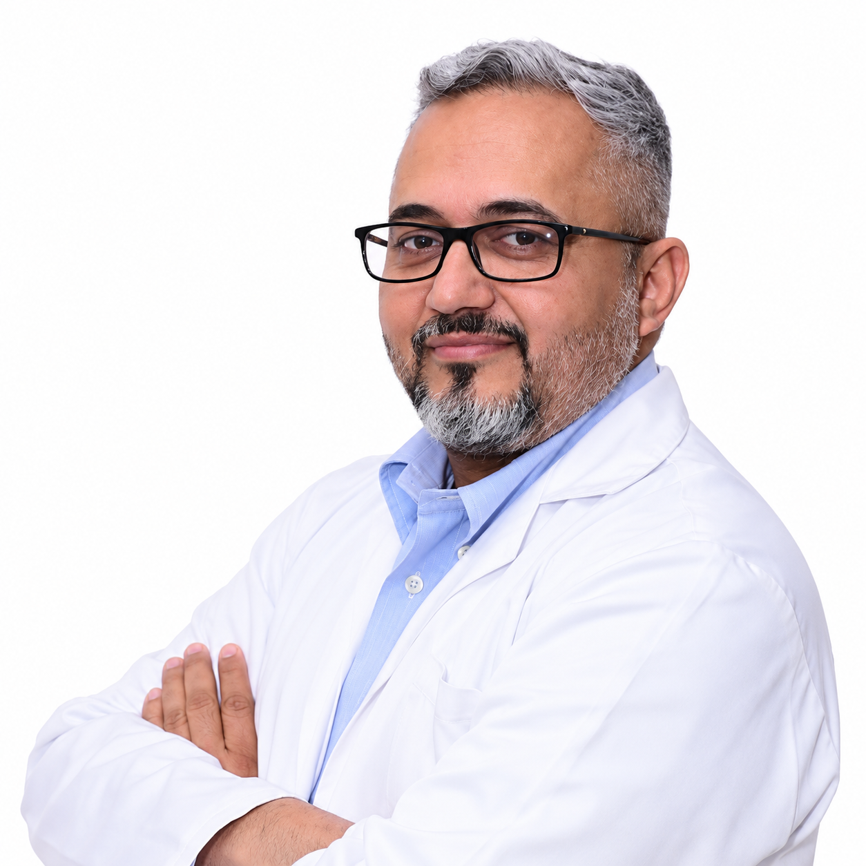 Dr. Nitish Anchal, Head of Department and Consultant in Vascular and Endovascular Surgery at Manipal Hospitals, Dwarka, New Delhi, wearing glasses and a white medical coat.