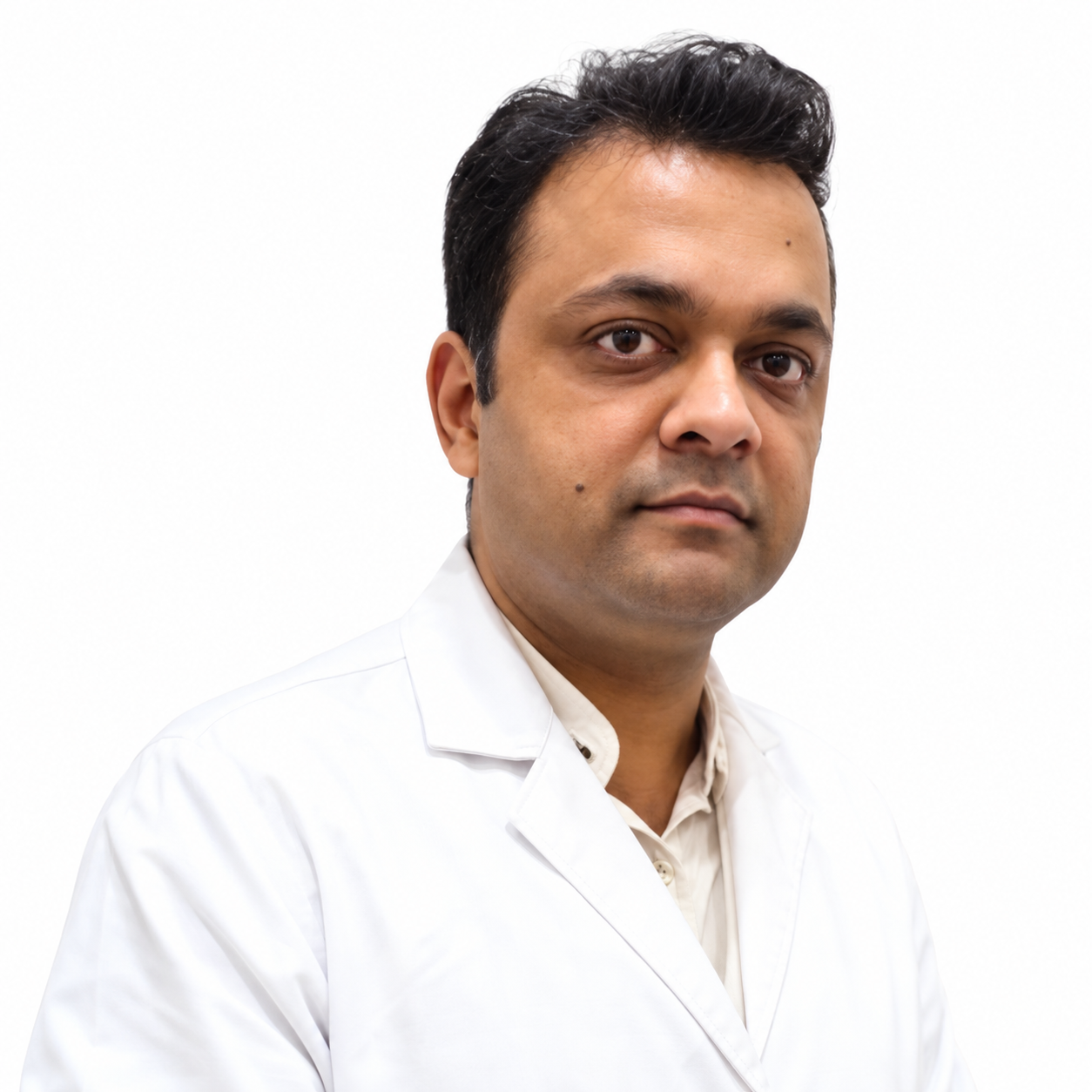 Dr. Vivek Garg wearing a white doctor’s coat over a light-colored shirt against a clean white background